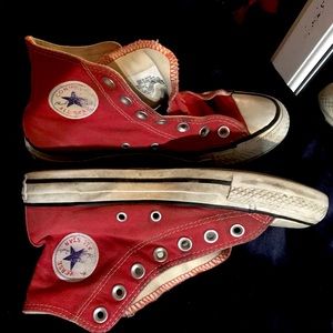 Red high top Chuck Taylor’s